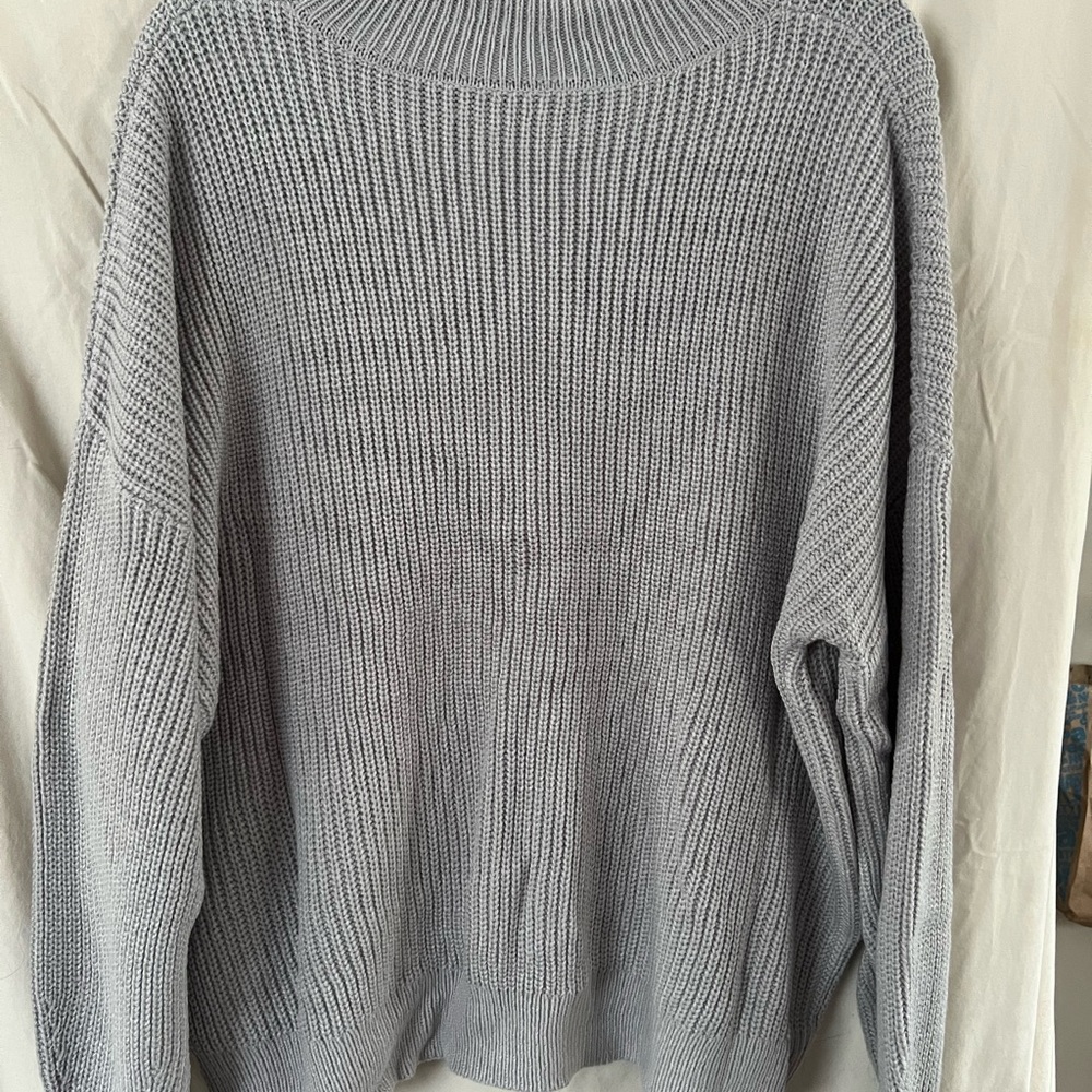 Woman’s Gray Sweater